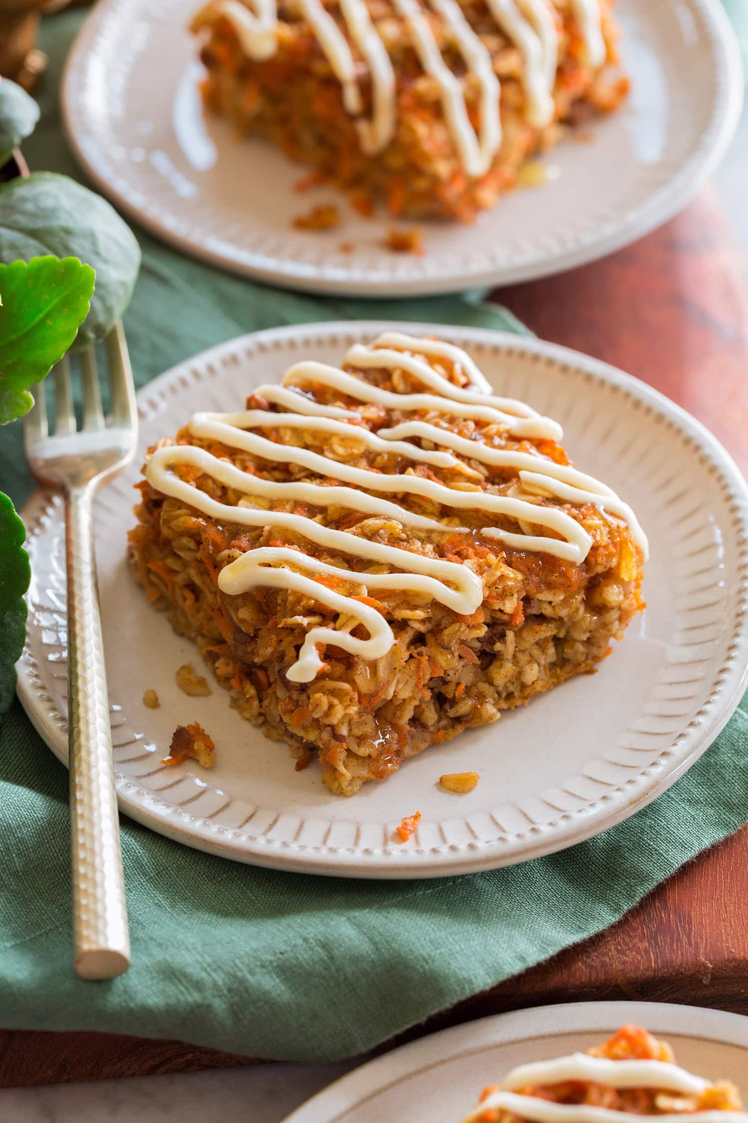 Slice of carrot cake baked oatmeal shown closer.