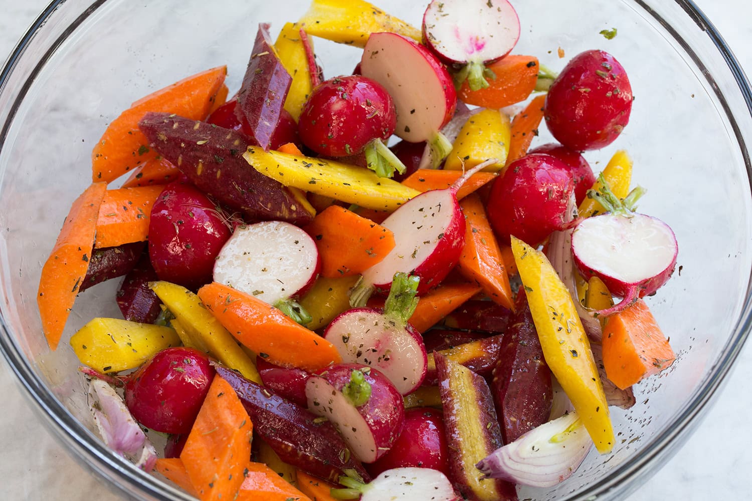 Vegetables shown after tossing in mixing bowl.
