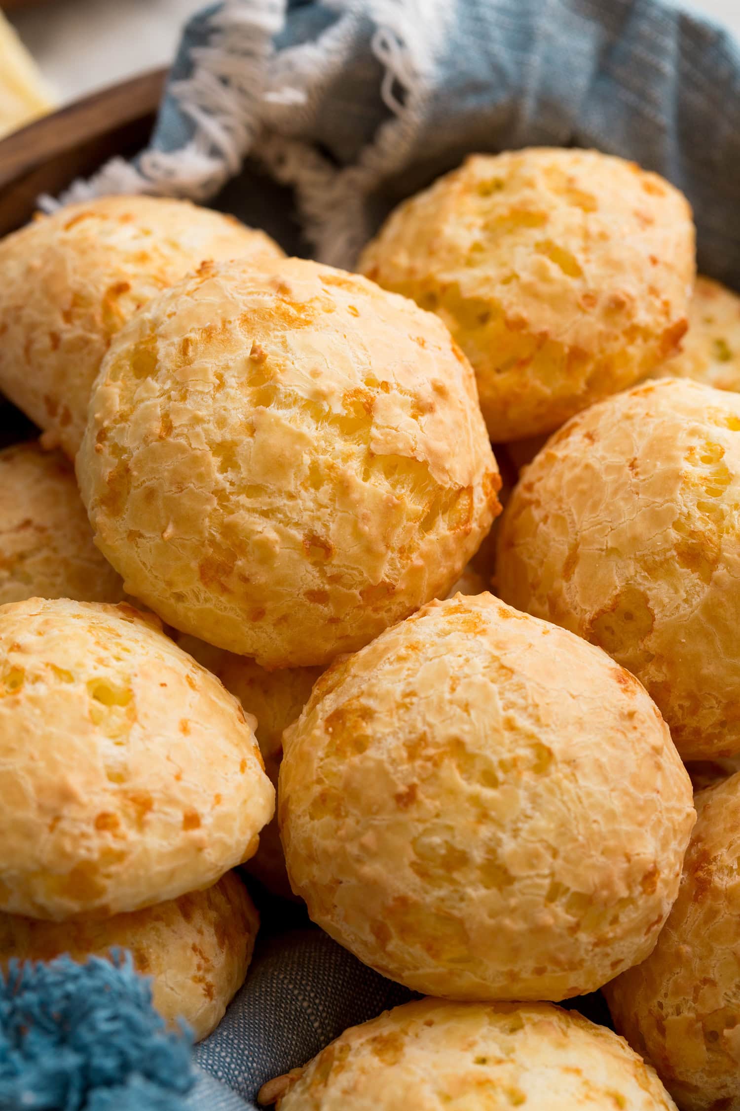 Brazilian Cheese Bread (Pão de Queijo) Close up photo of Brazilian cheese bread showing golden brown crust and crisp exterior.