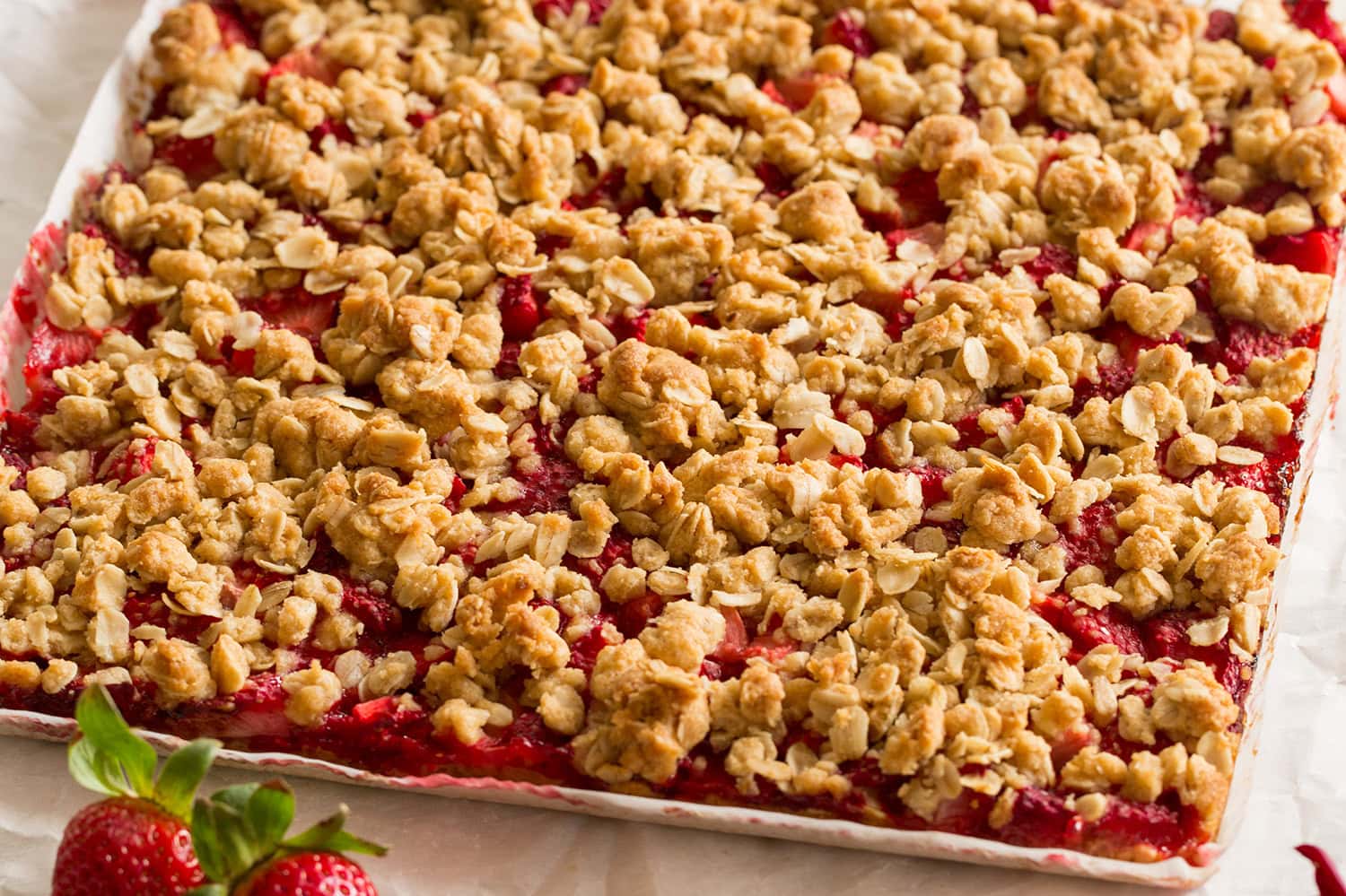 Berry filled breakfast bars shown after baking.