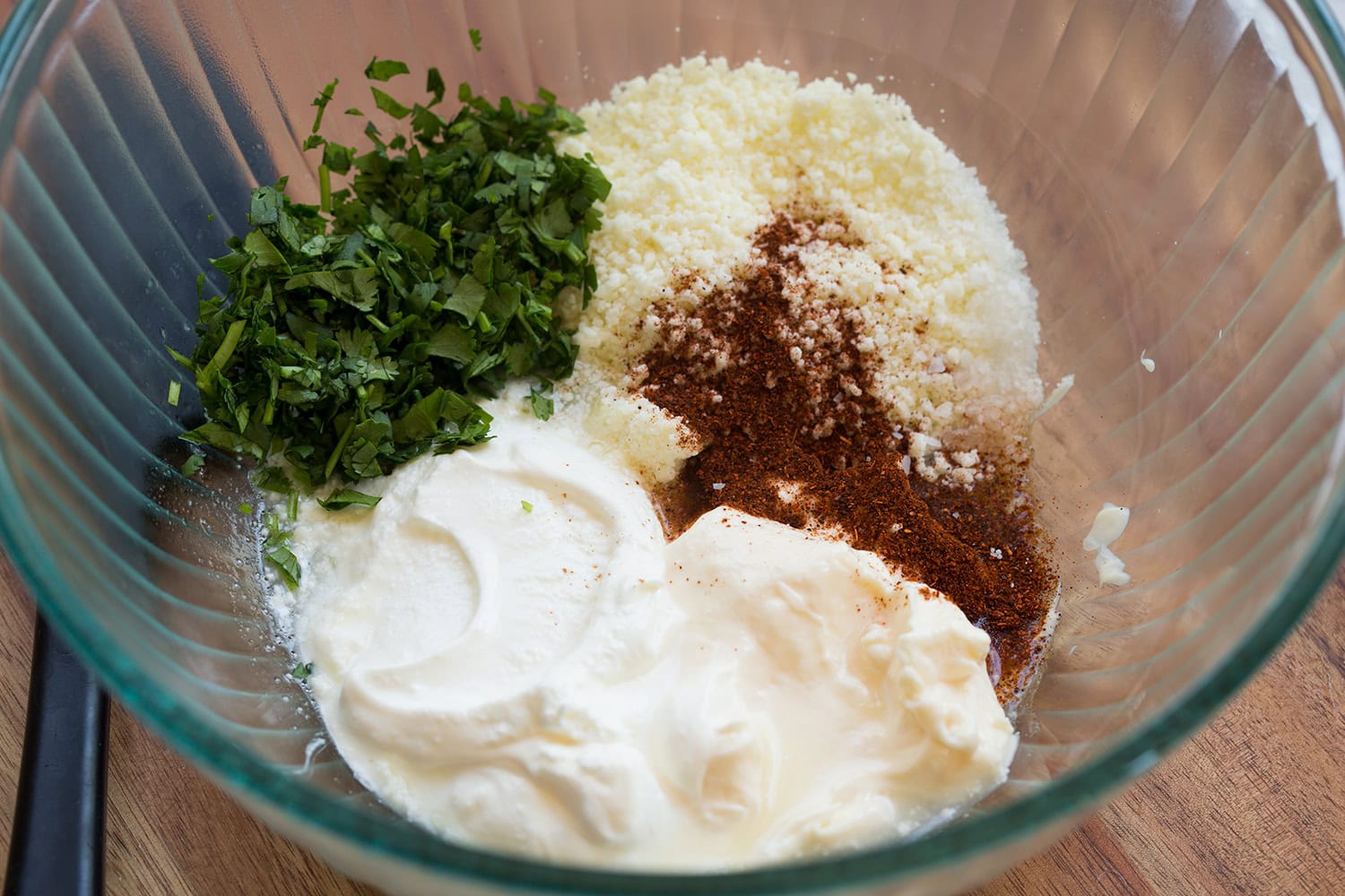 Street Corn Chicken Rice Bowl Street corn creamy mayo chili powder mixture before mixing.